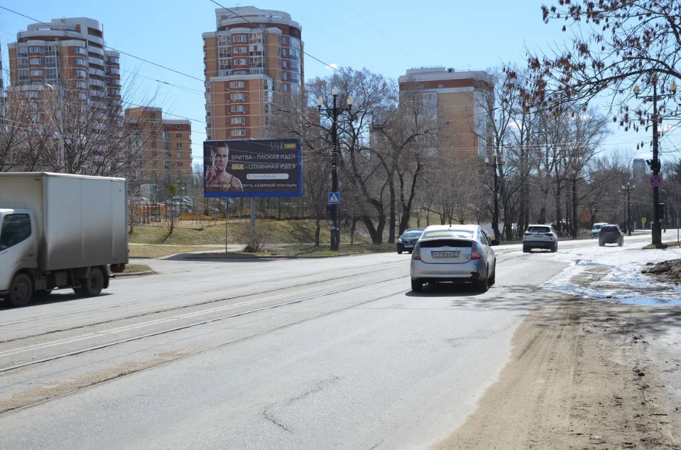 Фотография рекламного носителя, тип: Билборд 3x6, адрес: Шеронова ул., д.8, корп.2, Хабаровск, Хабаровский край, Россия. Сторона Б №971548