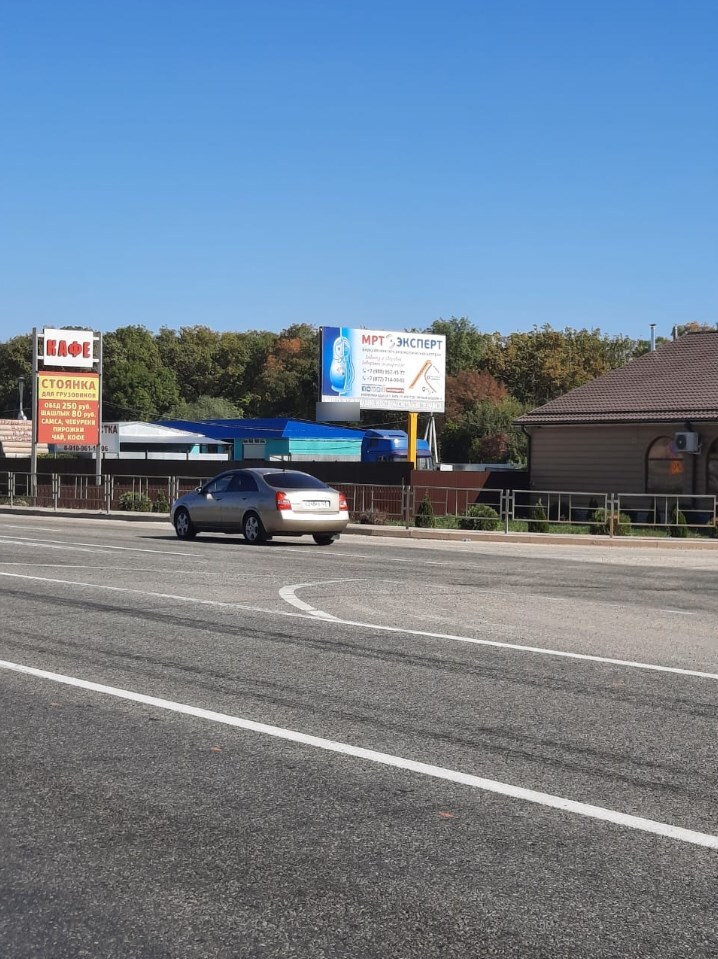 Фотография рекламного носителя, тип: Билборд 3x6, адрес: Краснодар-Новороссийск а/д, 28 130м, Энем, Республика Адыгея, Россия. Сторона А №1020511
