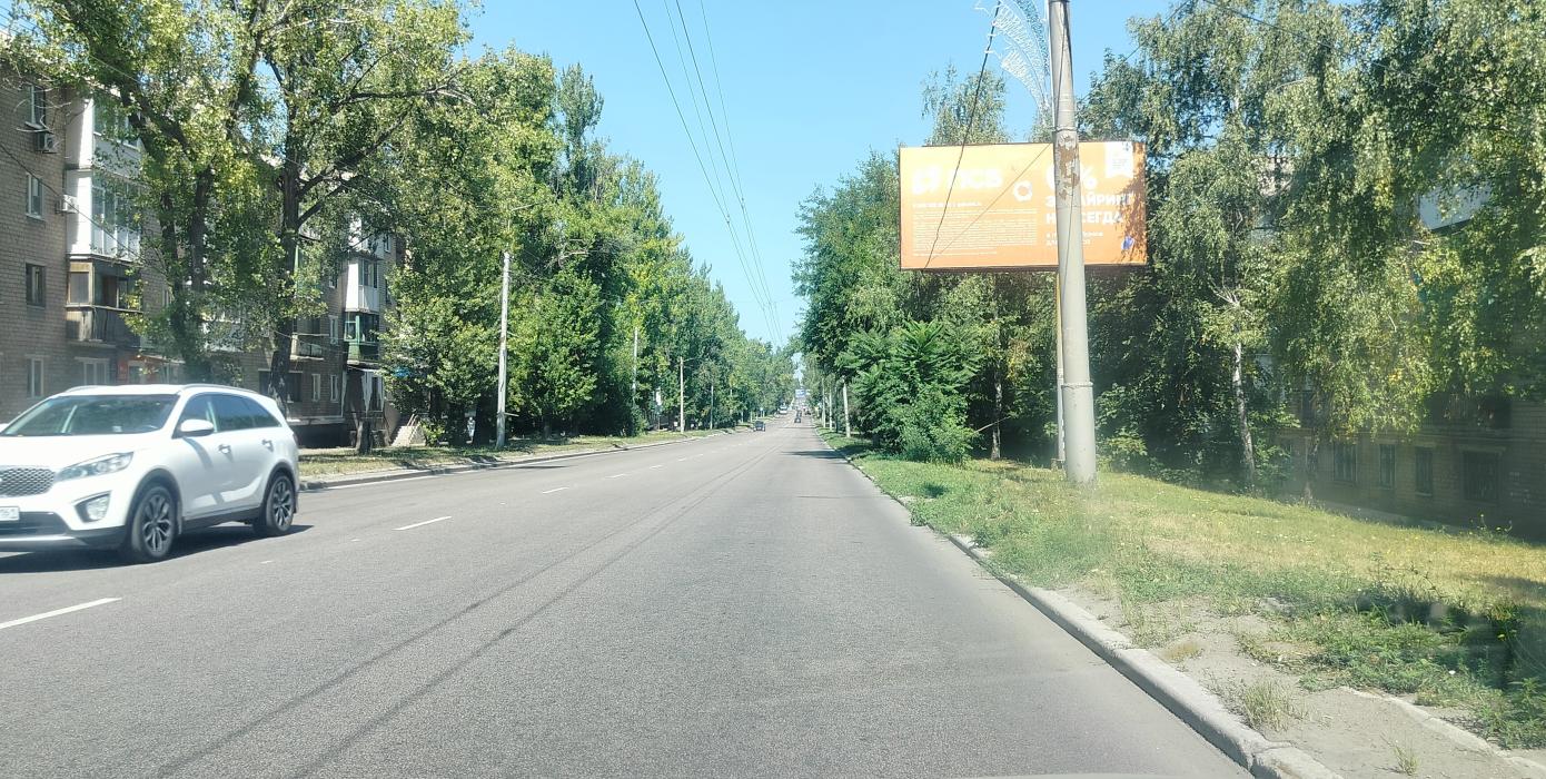 Фотография рекламного носителя, тип: Билборд 3x6, адрес: Ленина ул., ост. пл. Грибиниченко, поз.2, Макеевка, Донецкая область, Россия. Сторона A №1398023