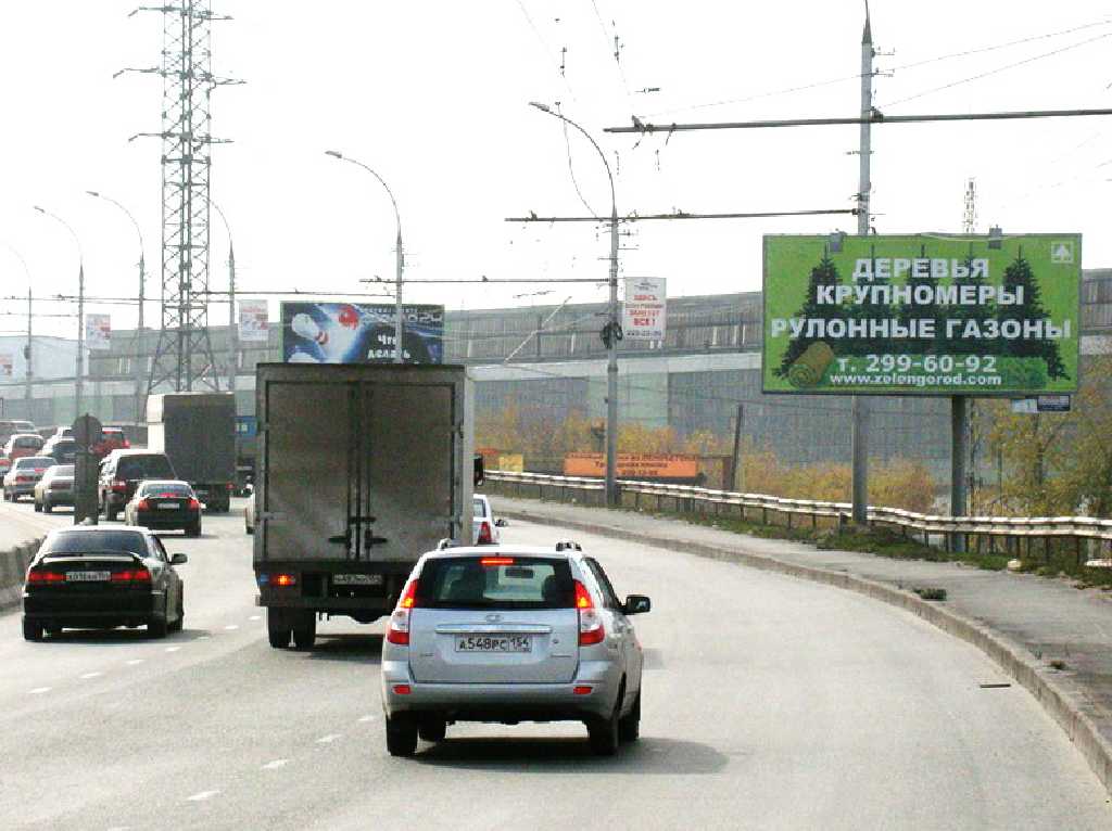 Фотография рекламного носителя, тип: Билборд 3x6, адрес: Димитровский мост, перед АЗС, Новосибирск, Новосибирская область, Россия. Сторона A №183902