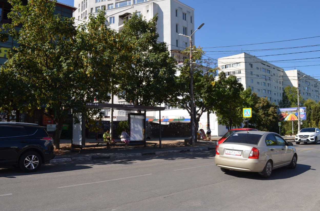 Фотография рекламного носителя, тип: Остановка 1.8x1.2, адрес: Фадеева ул., ост. Улица Парковая, Севастополь, Россия. Сторона Б1 №869596