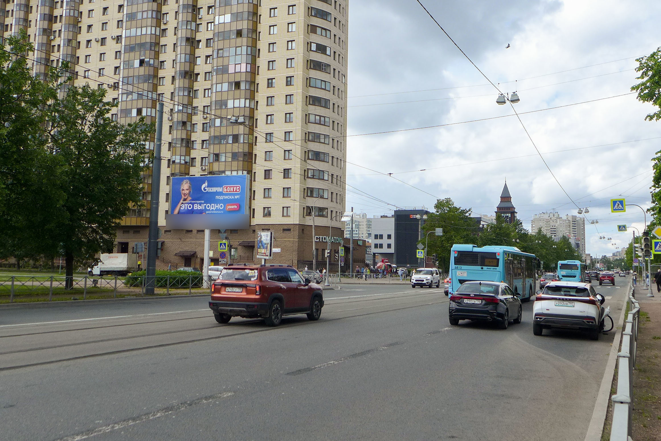 Фотография рекламного носителя, тип: Билборд 3x6, адрес: Науки пр-т., д.25 Х Бутлерова ул., Санкт-Петербург, Россия. Сторона Б №719304