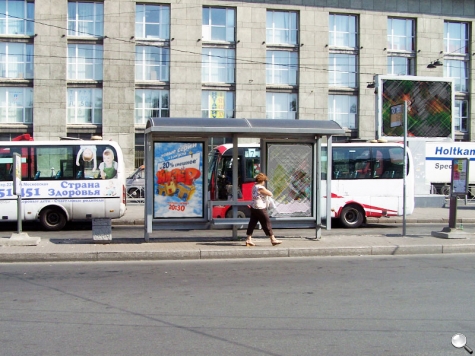 Фотография рекламного носителя, тип: Остановка 1.8x1.2, адрес: Балтийский вокзал пл. Х Митрофаньевское ш., д.2, корп.1, поз.1, Санкт-Петербург, Россия. Сторона А1 №164045