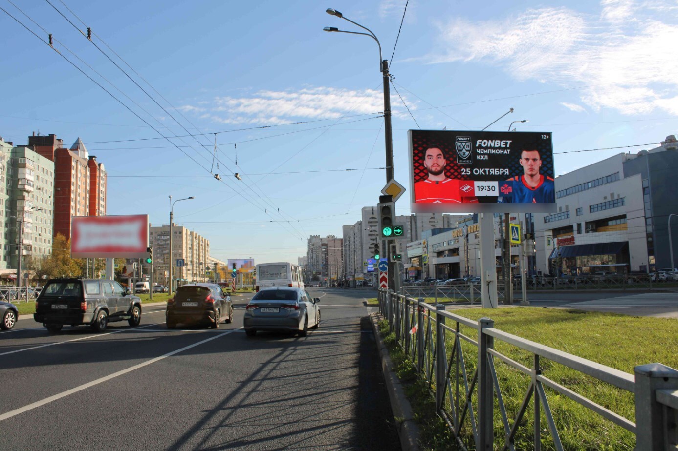 Фотография рекламного носителя, тип: Билборд 3x6, адрес: Просвещения пр-т. Хошимина ул., д.18, Санкт-Петербург, Россия. Сторона А1 №105877