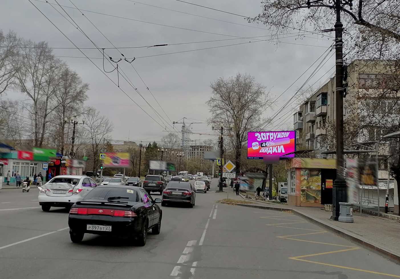 Фотография рекламного носителя, тип: Билборд 3x6, адрес: К.Маркса ул., ост. Пам.Партизанам, Хабаровск, Хабаровский край, Россия. Сторона А1 №100001
