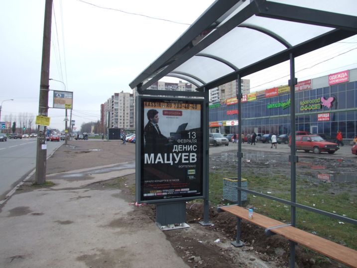 Фотография рекламного носителя, тип: Остановка 1.8x1.2, адрес: Караваевская ул., д.24, корп.1, Санкт-Петербург, Россия. Сторона А №209374