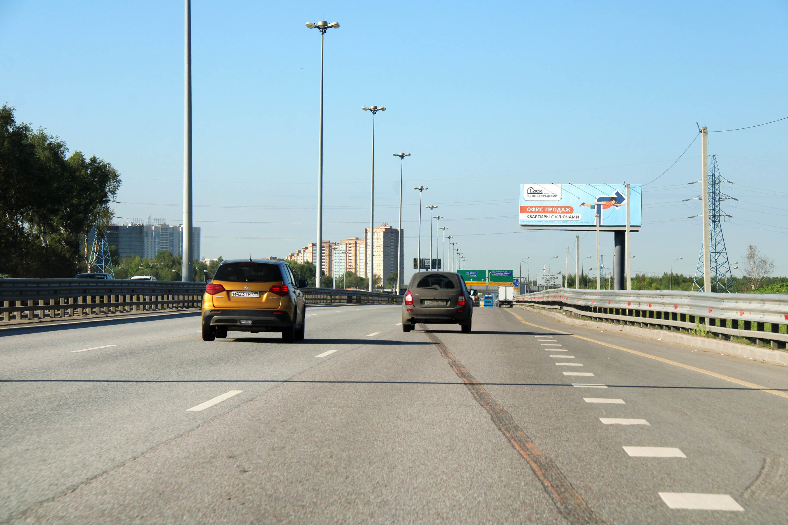 Фотография рекламного носителя, тип: Суперсайт 5x15, адрес: Международное ш., 1 400м после съезда с Ленинградского ш., поз.2, Москва, Россия. Сторона А №869170