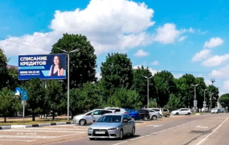 Фотография рекламного носителя, тип: Билборд 3x6, адрес: Советская ул., позиция 16 (район МФЦ), к ул. Короткова, Гулькевичи, Краснодарский край, Россия. Сторона В №1375454