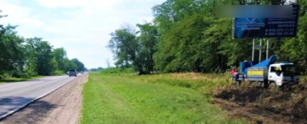 Фотография рекламного носителя, тип: Билборд 3x6, адрес: Гулькевичи - Кропоткин а/д., 2 890м., поз.48, Гулькевичи, Краснодарский край, Россия. Сторона А №1374148