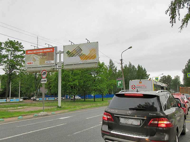 Фотография рекламного носителя, тип: Билборд 3x6, адрес: Приморское ш. Х Лахтинский пр-т., д.119, Санкт-Петербург, Россия. Сторона A21-A23 №176939