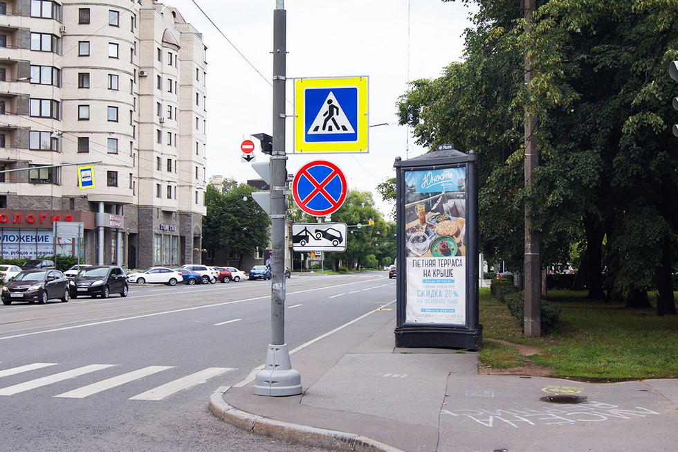 Фотография рекламного носителя, тип: Пиллар 3x1.4, адрес: Савушкина ул., д.21 Х Академика Шиманского ул., Санкт-Петербург, Россия. Сторона А №144462