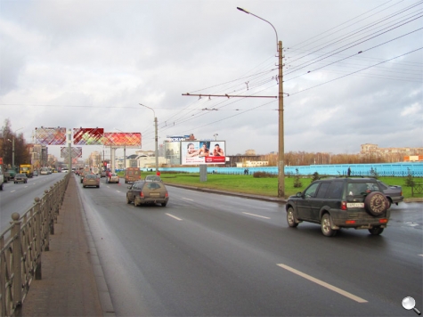 Фотография рекламного носителя, тип: Билборд 3x6, адрес: Большевиков пр-т., д.25, Санкт-Петербург, Россия. Сторона А №165363