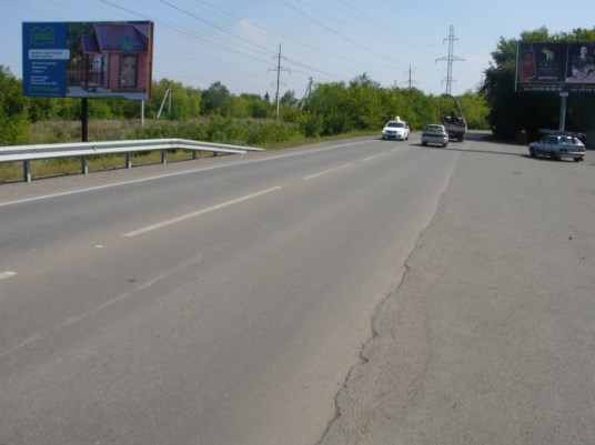 Фотография рекламного носителя, тип: Билборд 3x6, адрес: Дачное ш., д.3, корп.1, Магнитогорск, Челябинская область, Россия. Сторона Б №1348749
