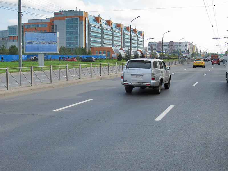 Фотография рекламного носителя, тип: Билборд 3x6, адрес: Большевиков пр-т., д.25, Санкт-Петербург, Россия. Сторона В №165364