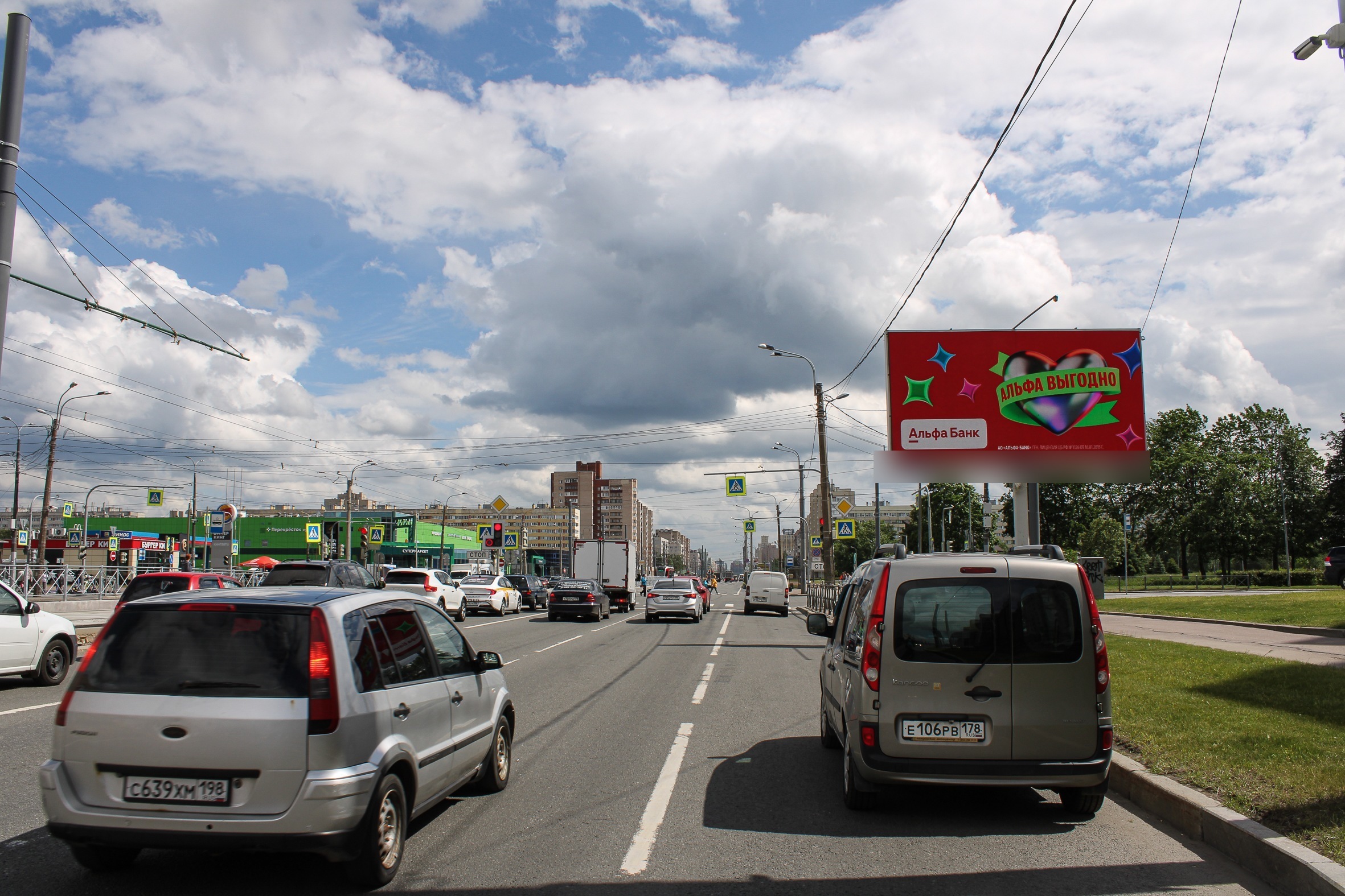 Фотография рекламного носителя, тип: Билборд 3x6, адрес: Просвещения пр-т., д.53, корп.1 Х Демьяна Бедного ул., Санкт-Петербург, Россия. Сторона А1 №719408
