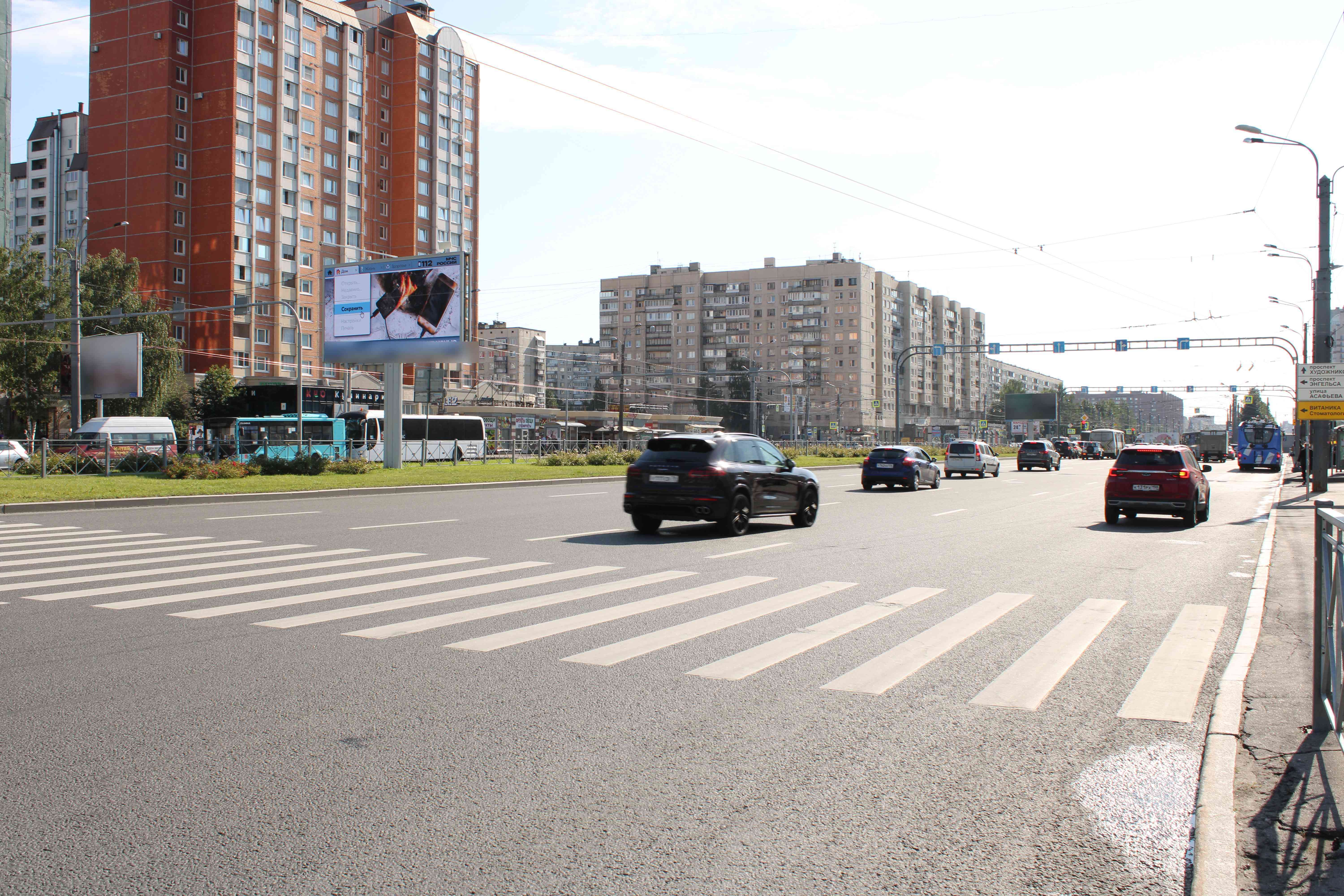 Фотография рекламного носителя, тип: Билборд 3x6, адрес: Энгельса пр-т. Х Хошимина ул. Х Просвещения пр-т., Санкт-Петербург, Россия. Сторона А1 №105875