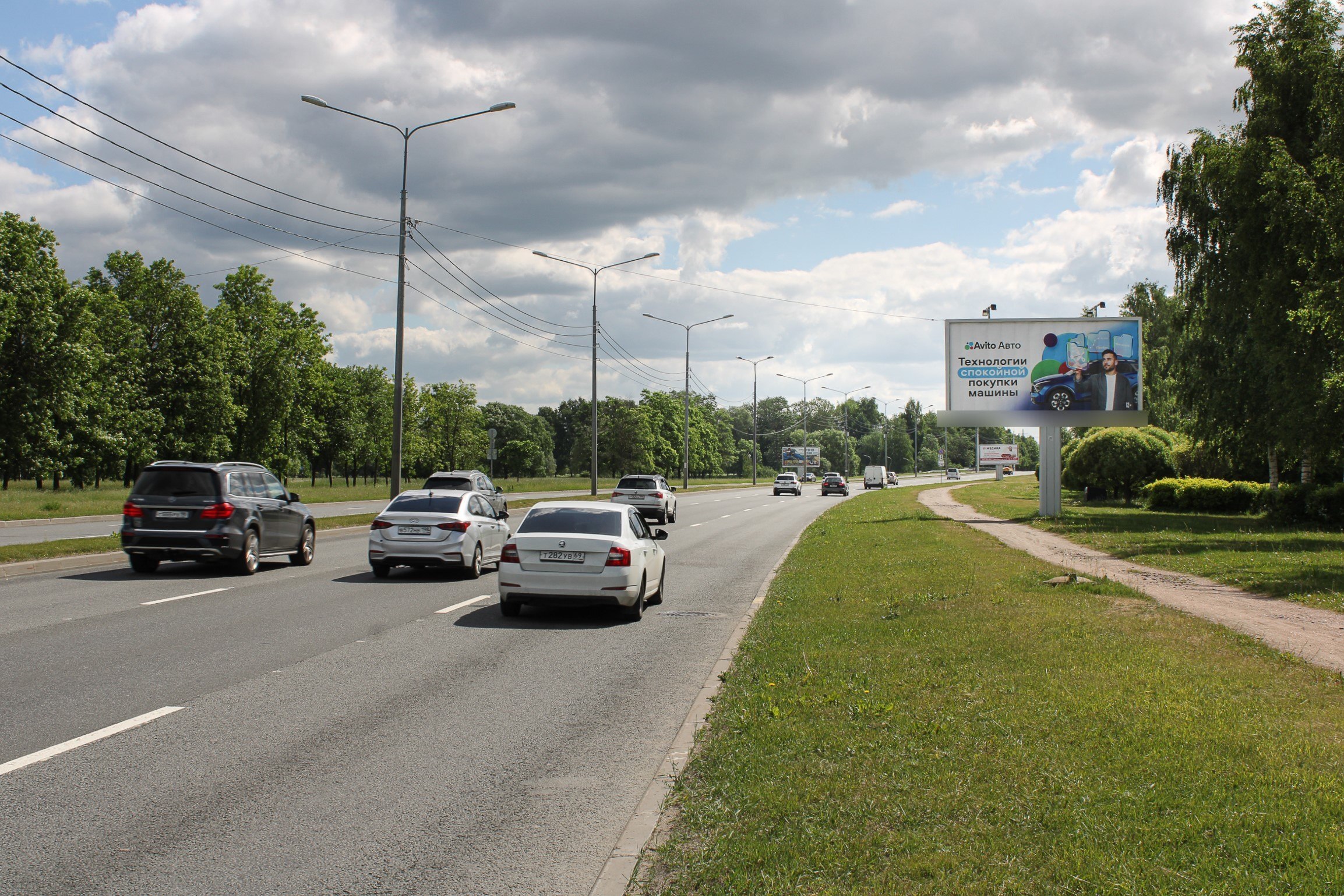 Фотография рекламного носителя, тип: Билборд 3x6, адрес: Северный пр-т. Х Академика Байкова ул., д.2, Санкт-Петербург, Россия. Сторона А №673316