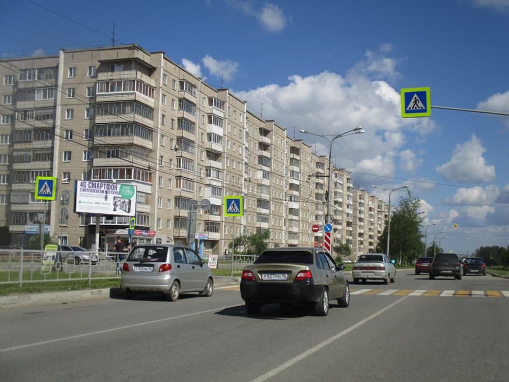 Фотография рекламного носителя, тип: Билборд 3x6, адрес: Уральский пр-т., между д.36 и д.40, Нижний Тагил, Свердловская область, Россия. Сторона B1 №484646