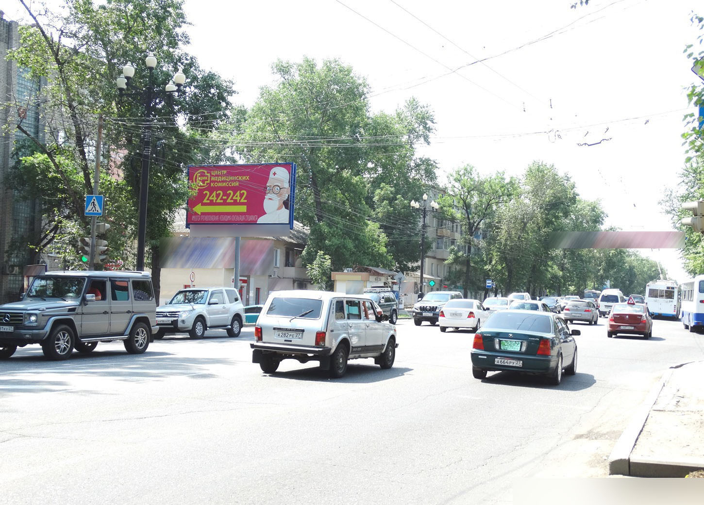 Фотография рекламного носителя, тип: Билборд 3x6, адрес: К.Маркса ул., ост. Пам.Партизанам, Хабаровск, Хабаровский край, Россия. Сторона Б №100002