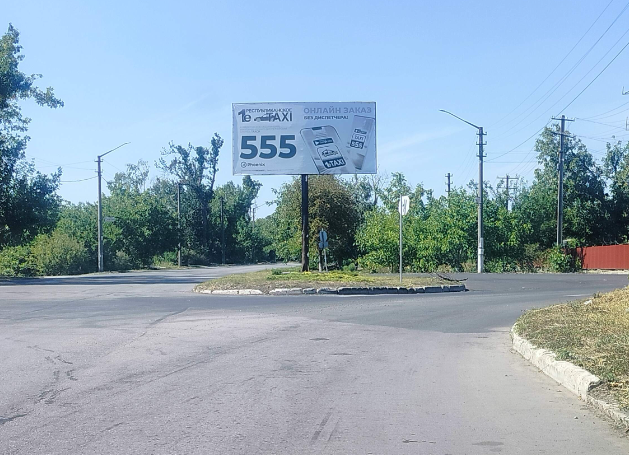 Фотография рекламного носителя, тип: Билборд 3x6, адрес: Харцызск г., Островского ул. Х Зугресская ул., Харцызск, Донецкая область, Россия. Сторона А №1336725