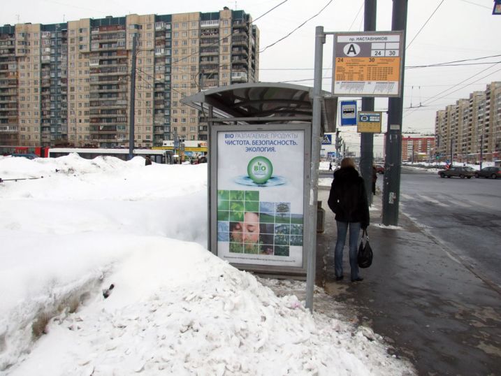 Фотография рекламного носителя, тип: Остановка 1.8x1.2, адрес: Косыгина пр-т., д.26, корп.1, Санкт-Петербург, Россия. Сторона Б №130015