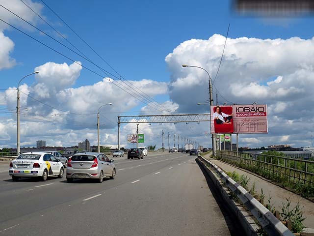 Фотография рекламного носителя, тип: Билборд 3x6, адрес: Лукашевича ул., ост. Мостоотряд, поз.2, Омск, Омская область, Россия. Сторона A №197262
