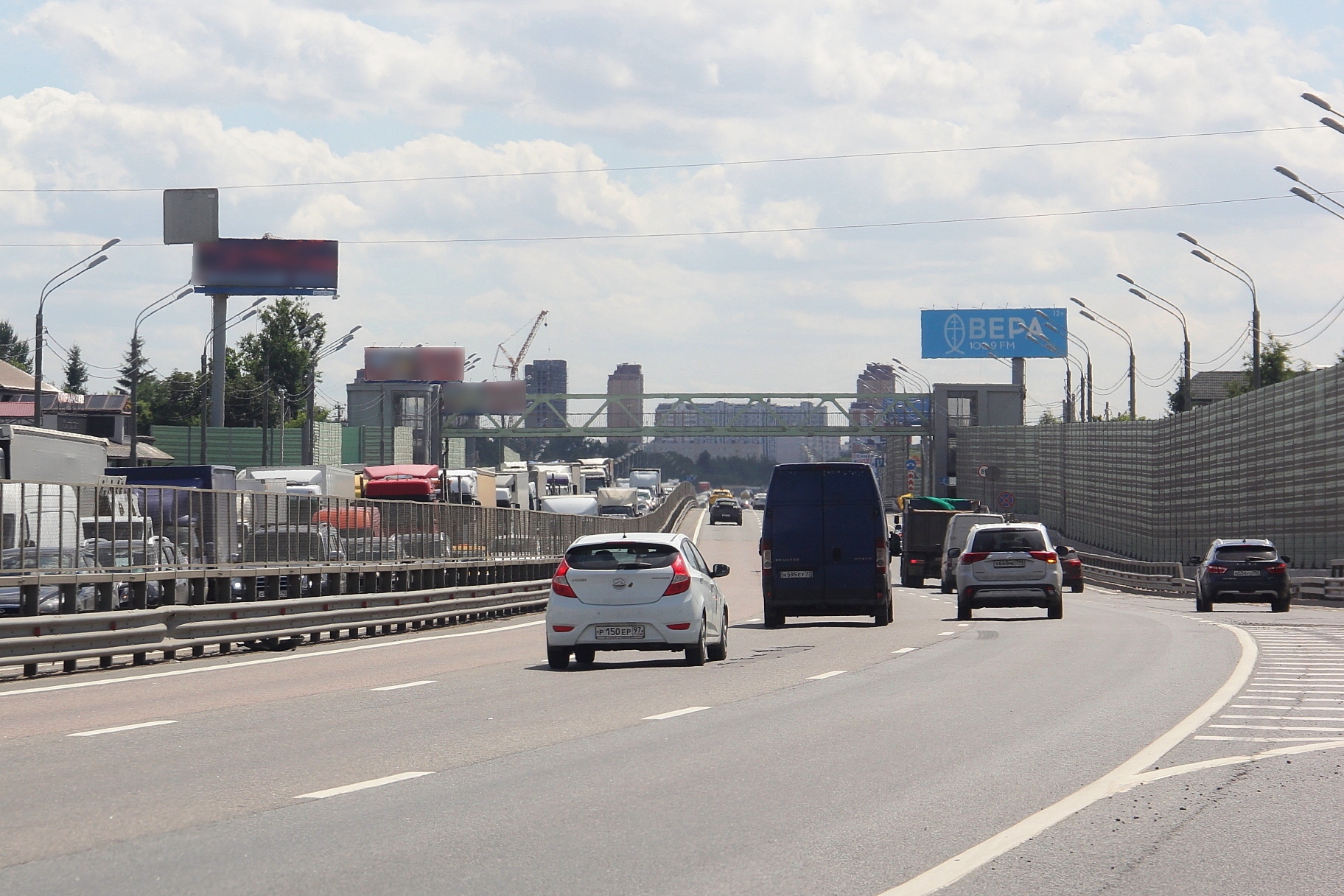 Фотография рекламного носителя, тип: Суперсайт 5x15, адрес: Грибки д., Дмитровское ш., д.29, Мытищи, Московская область, Россия. Сторона А №1076313