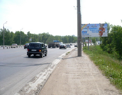 Фотография рекламного носителя, тип: Билборд 3x6, адрес: Октябрьский мост, 40 м от въезда на о-в Татышева, Красноярск, Красноярский край, Россия. Сторона A №88534