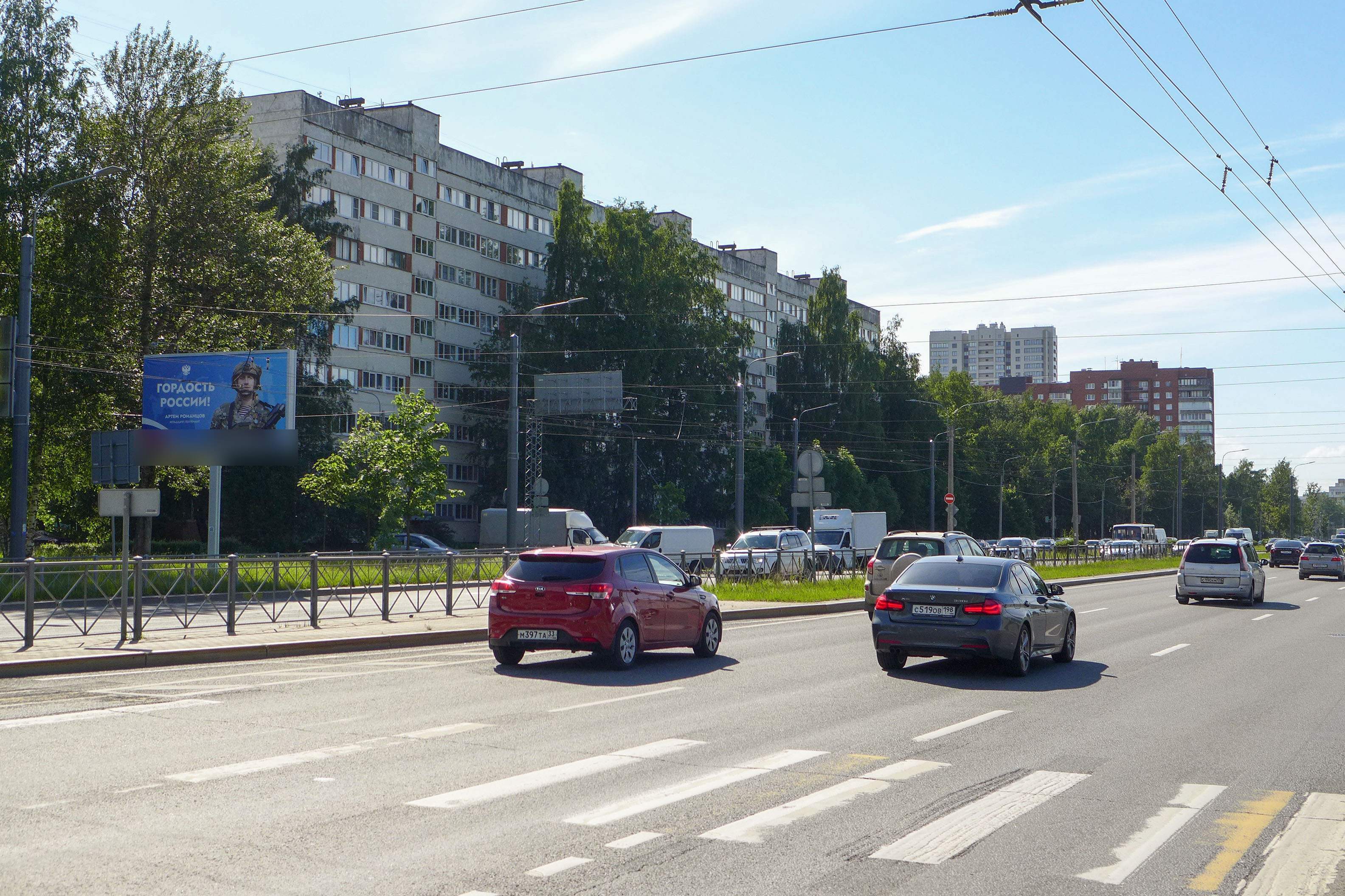 Фотография рекламного носителя, тип: Билборд 3x6, адрес: Суздальский пр-т., д.97 Х Ушинского ул., Санкт-Петербург, Россия. Сторона Б1 №631953
