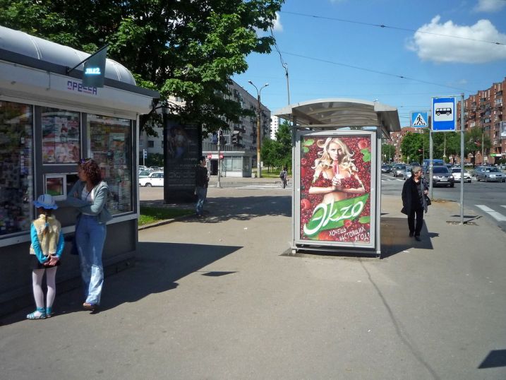Фотография рекламного носителя, тип: Остановка 1.8x1.2, адрес: Тореза пр-т., д.36, Санкт-Петербург, Россия. Сторона Б №129786