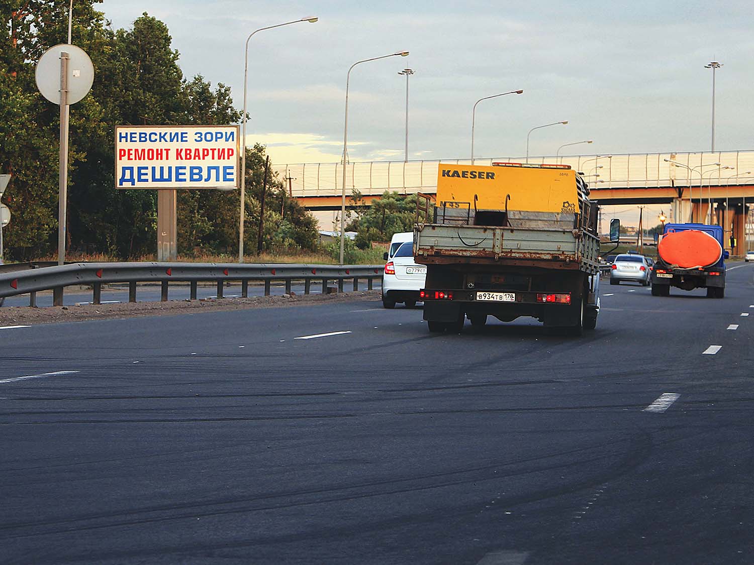 Фотография рекламного носителя, тип: Билборд 3x6, адрес: Октябрьская наб., перед вантовым мостом КАД, Санкт-Петербург, Россия. Сторона Б №131521