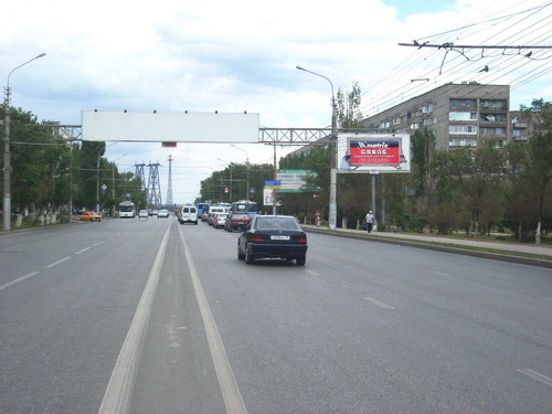 Фотография рекламного носителя, тип: Билборд 3x6, адрес: Николая Отрады ул. Х Кастерина ул., DNS Компьютерный магазин, Волгоград, Волгоградская область, Россия. Сторона А №83033