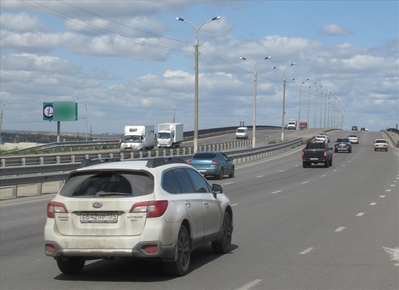 Фотография рекламного носителя, тип: Билборд 3x6, адрес: Дорожников пр-зд., перед путепроводом, Волгоград, Волгоградская область, Россия. Сторона А3 №111232