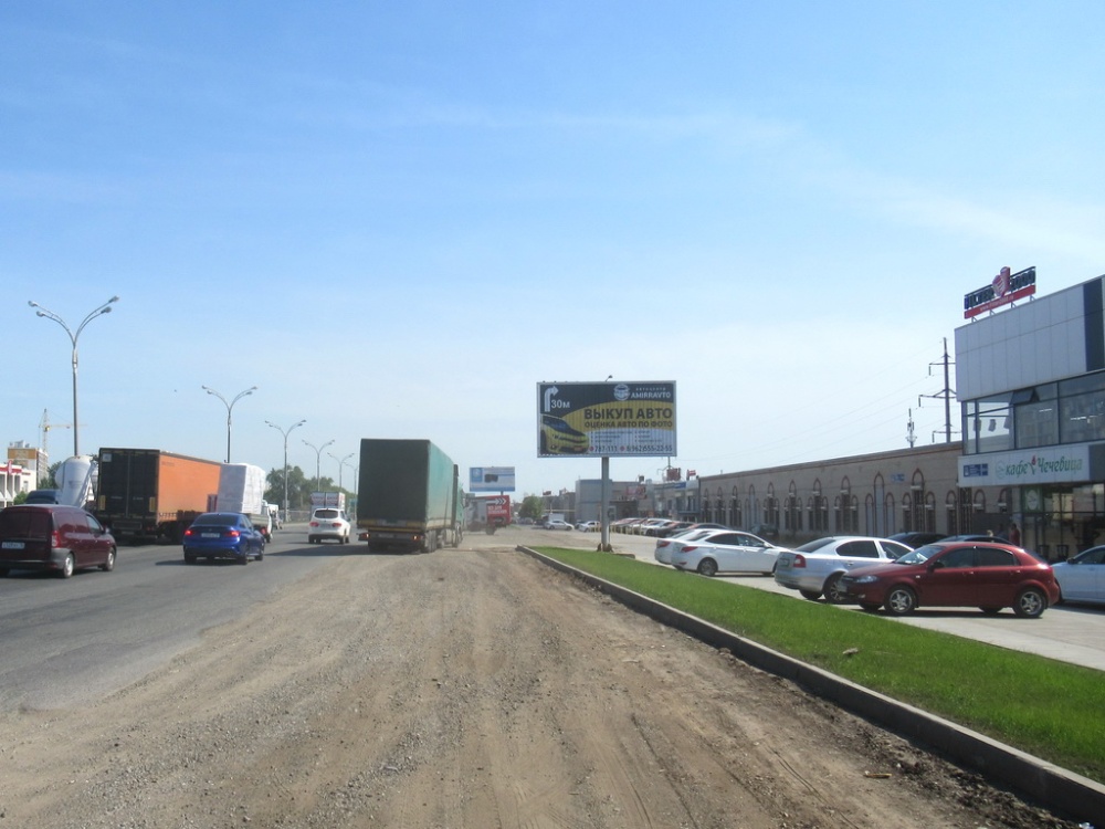 Фотография рекламного носителя, тип: Билборд 3x6, адрес: М-7 "Волга" трасса, 1049 410м, Набережные Челны, Республика Татарстан, Россия. Сторона A1-A3 №632105