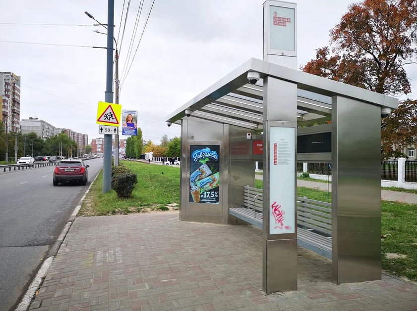 Фотография рекламного носителя, тип: Остановка, адрес: Краснодонцев ул., ост. Комсомольская ул., Нижний Новгород, Нижегородская область, Россия. Сторона A1-А10 №873316