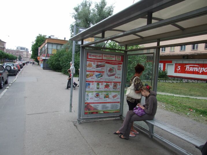 Фотография рекламного носителя, тип: Остановка 1.8x1.2, адрес: Новочеркасский пр-т., д.38, Санкт-Петербург, Россия. Сторона А №130050