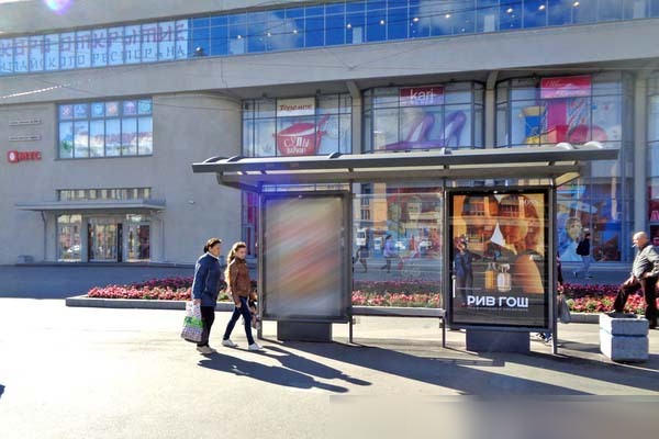 Фотография рекламного носителя, тип: Остановка 1.8x1.2, адрес: Стачек пр-т., д.9, поз.2, Санкт-Петербург, Россия. Сторона А1 №140766