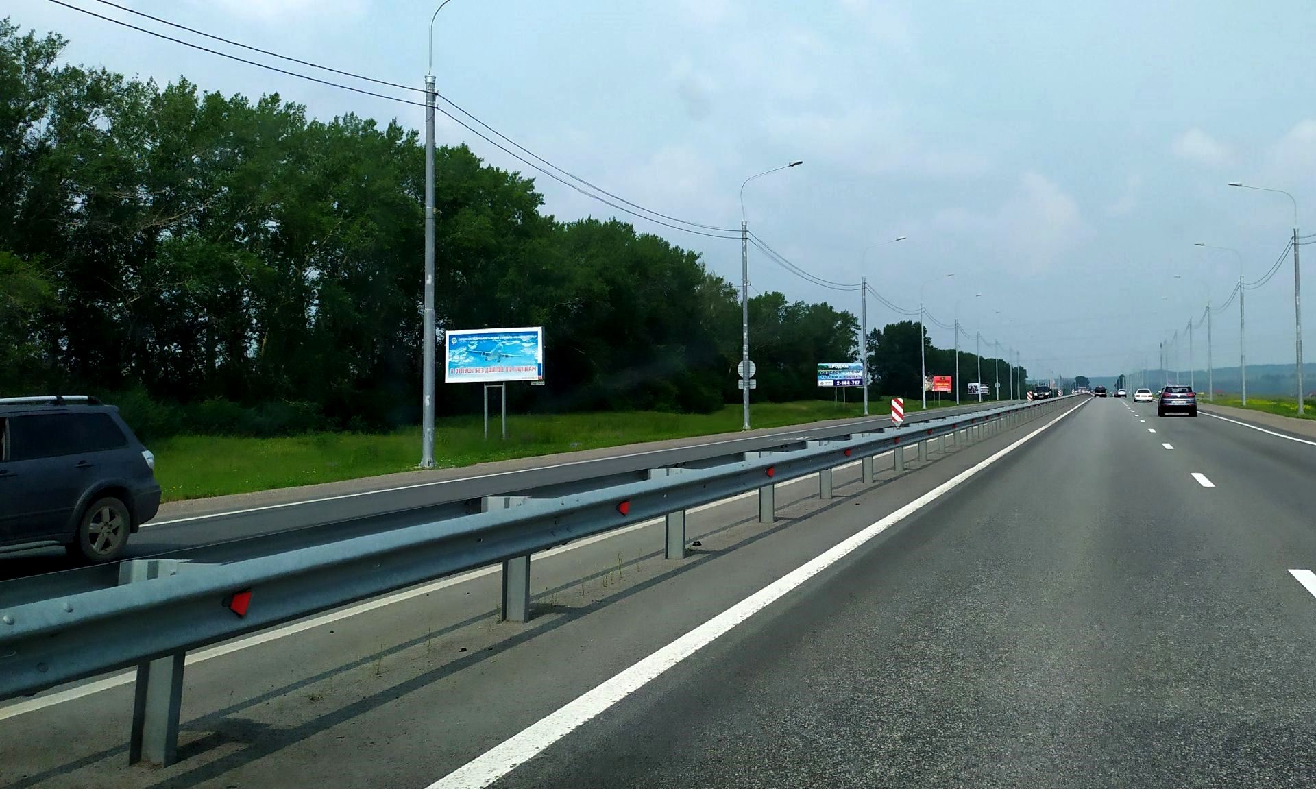 Фотография рекламного носителя, тип: Билборд 3x6, адрес: М-53 а/д., 799 800м, Красноярский край, Россия. Сторона А №1361780