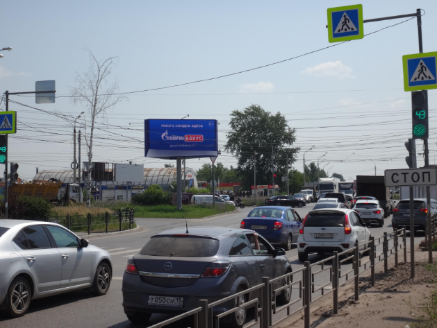 Фотография рекламного носителя, тип: Билборд 3x6, адрес: Магистральная ул. Х Сарапульский тракт, Ижевск, Республика Удмуртия, Россия. Сторона Б1 №292789