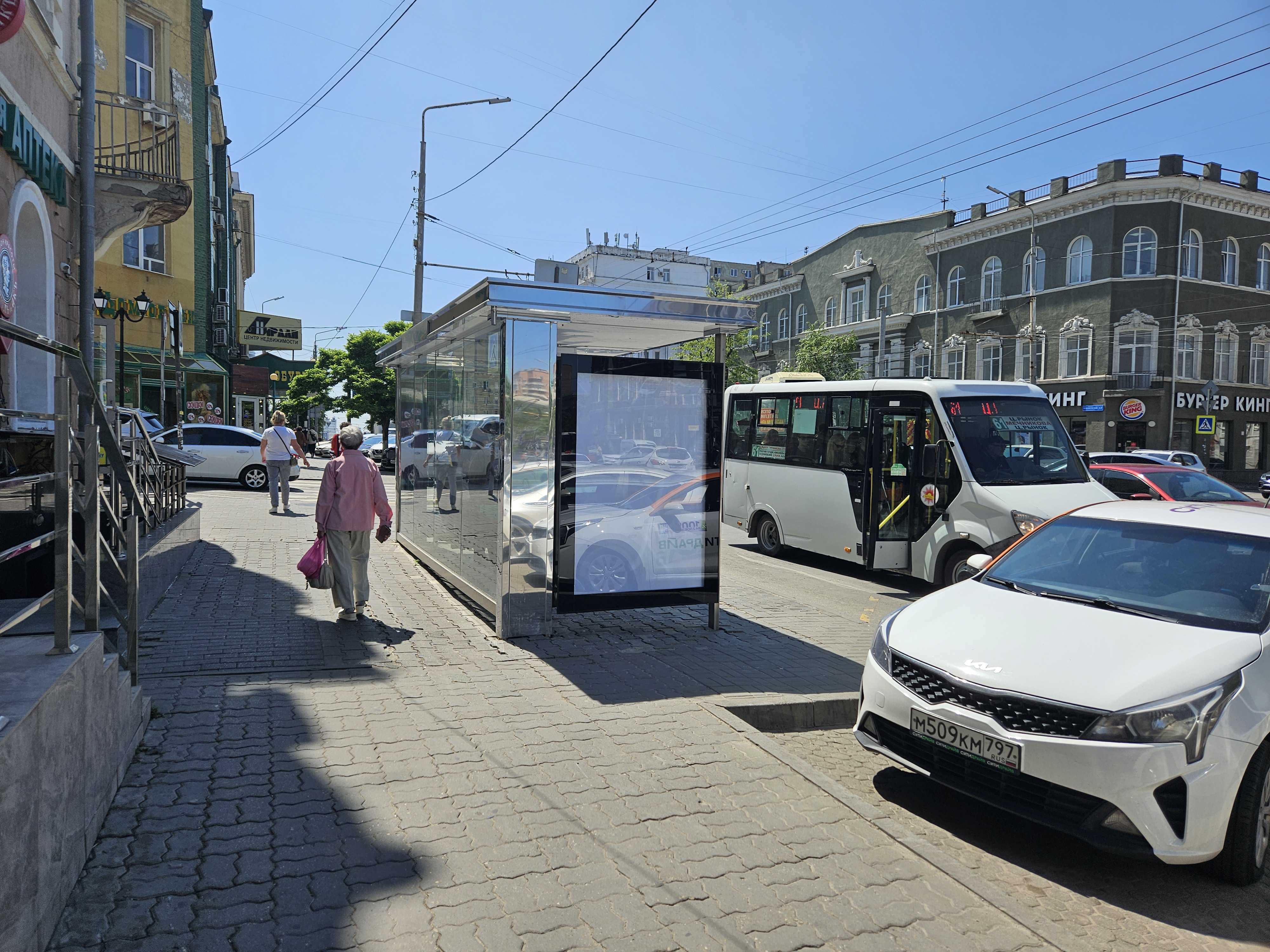 Фотография рекламного носителя, тип: Остановка 1.8x1.2, адрес: Буденновский пр-т., д.24, Ростов-на-Дону, Ростовская область, Россия. Сторона Б №1370442