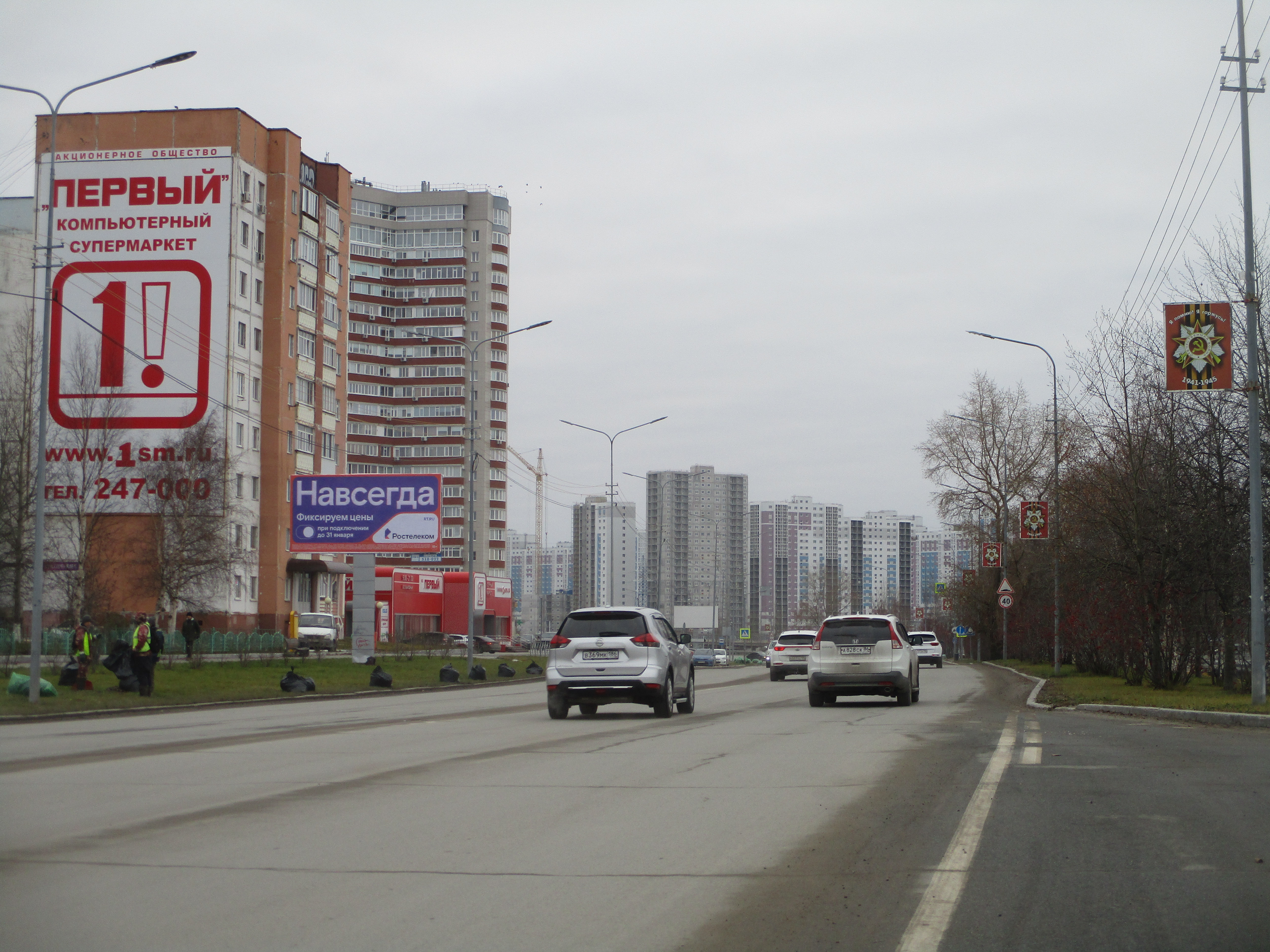 Фотография рекламного носителя, тип: Билборд 3x6, адрес: Гагарина ул., д.26, Сургут, Ханты-Мансийский автономный округ – Югра, Россия. Сторона Б №696250