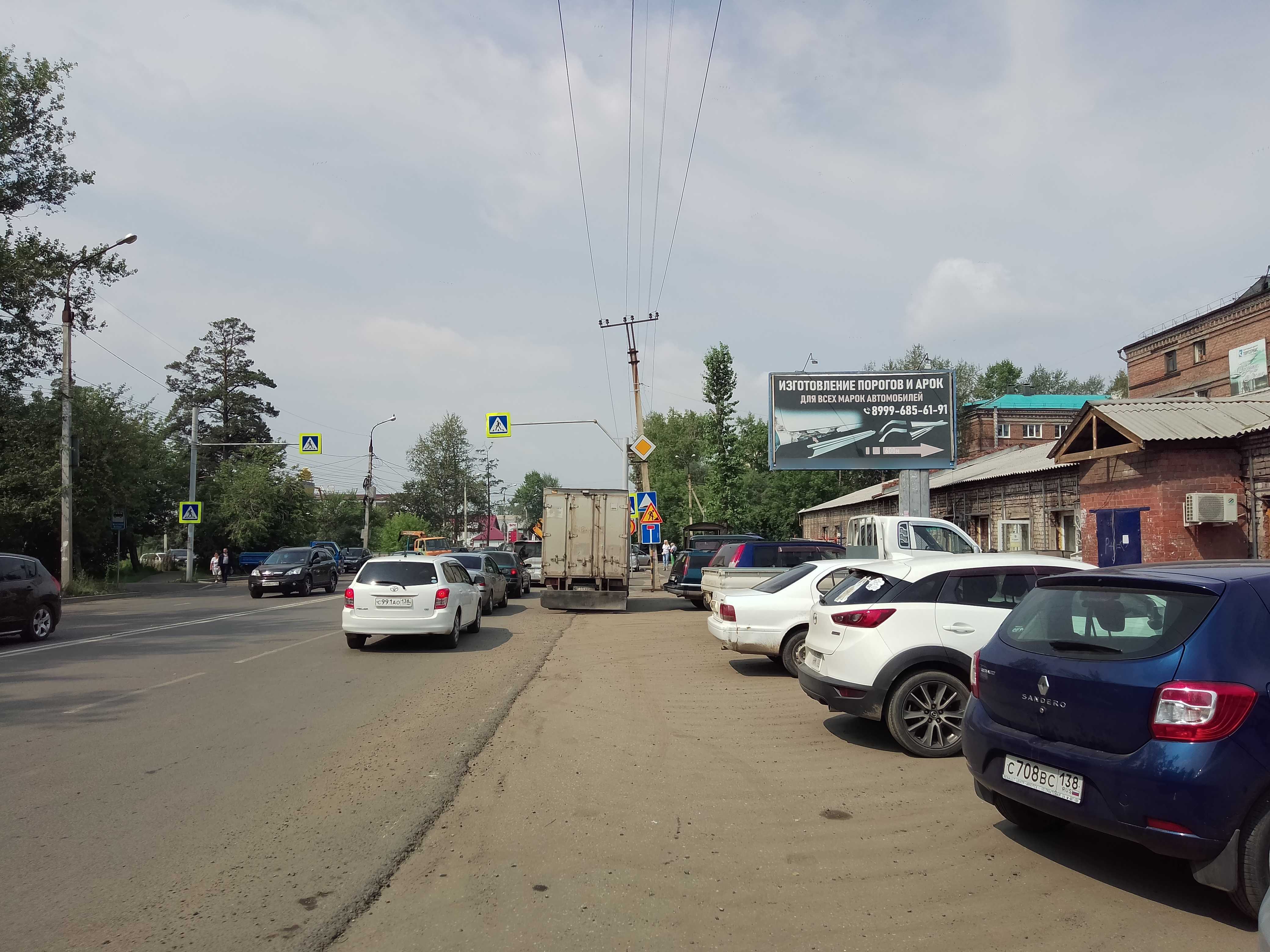 Фотография рекламного носителя, тип: Билборд 3x6, адрес: Баррикад ул., рынок "Торгсервис", Иркутск, Иркутская область, Россия. Сторона А №155106