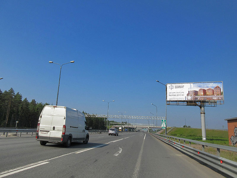 Фотография рекламного носителя, тип: Суперсайт 5x15, адрес: КАД, 8 990м, Санкт-Петербург, Россия. Сторона А №164364