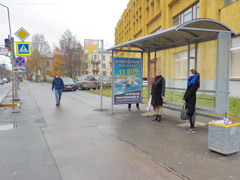 Фотография рекламного носителя, тип: Остановка 1.8x1.2, адрес: Савушкина ул., д.76, Санкт-Петербург, Россия. Сторона А №165694