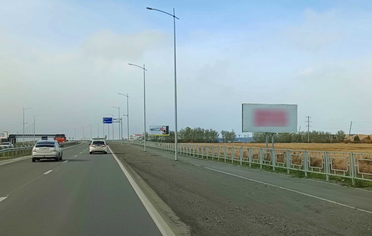 Фотография рекламного носителя, тип: Билборд 3x6, адрес: 04К-297 а/д., 1 550м, Красноярский край, Россия. Сторона А №1361810