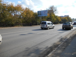 Фотография рекламного носителя, тип: Билборд 3x6, адрес: Красноармейская ул., мост, Томск, Томская область, Россия. Сторона Б №472270