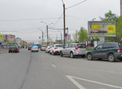 Фотография рекламного носителя, тип: Билборд 3x6, адрес: Дыбенко ул., д.27, корп.1 Х Большевиков пр-т., Санкт-Петербург, Россия. Сторона A №169047